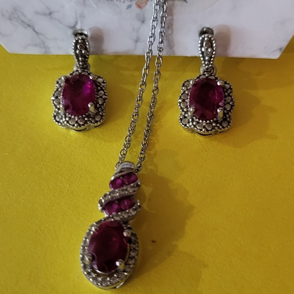Ruby and diamond necklace and earrings set. Sterling silver.